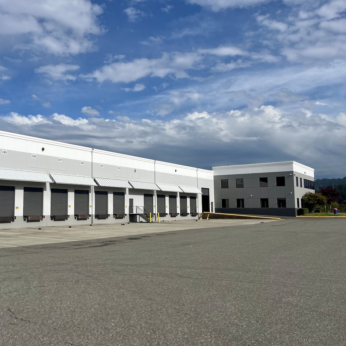 SR167 Project Entailed A Full Exterior Repaint Of Two Buildings' Walls, Doors And Awnings