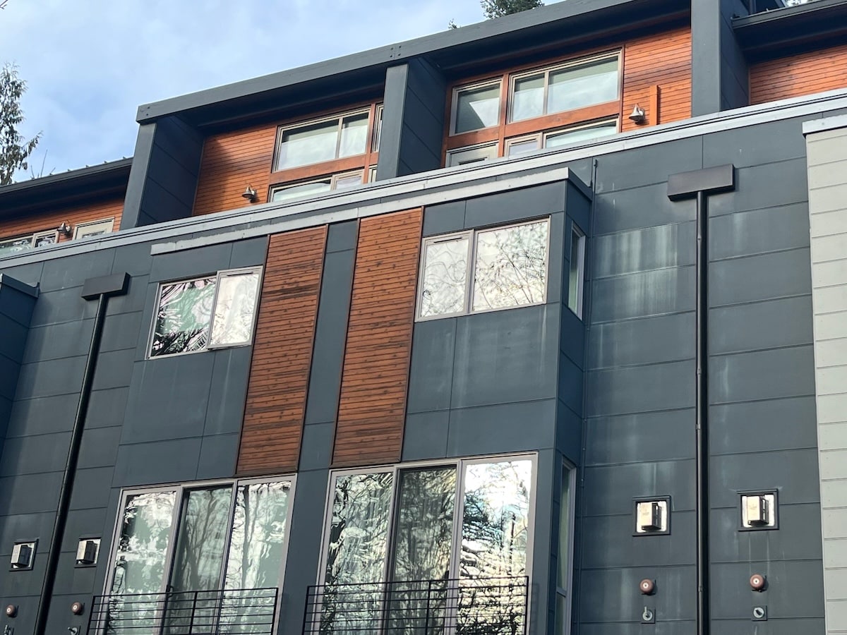 Fiber Cement Siding (blue) Experiencing Chalking. Pressure-Wash And Repaint To Refresh.